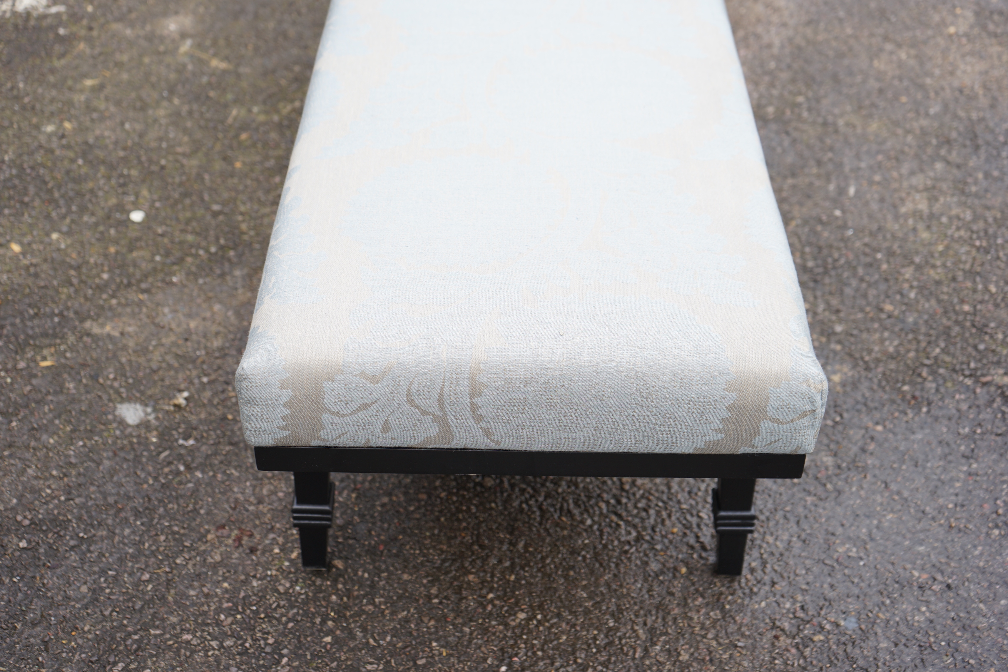 A Bray Design black walnut fireplace bench upholstered in Robert Allen Glamis Nile fabric, width 158cm, depth 46cm, height 44cm